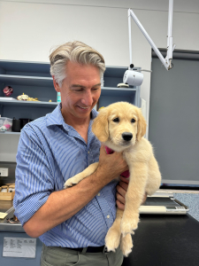 Dr Doug with Honey, the therapy dog for endED